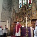 Fr Bob rededicating High Altar Reredos on its Centenary 