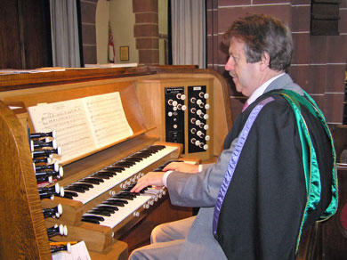 Organist John Riley playing